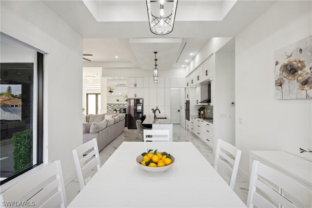 dining area featuring sink