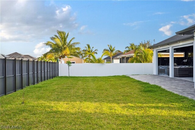 view of yard with a patio area