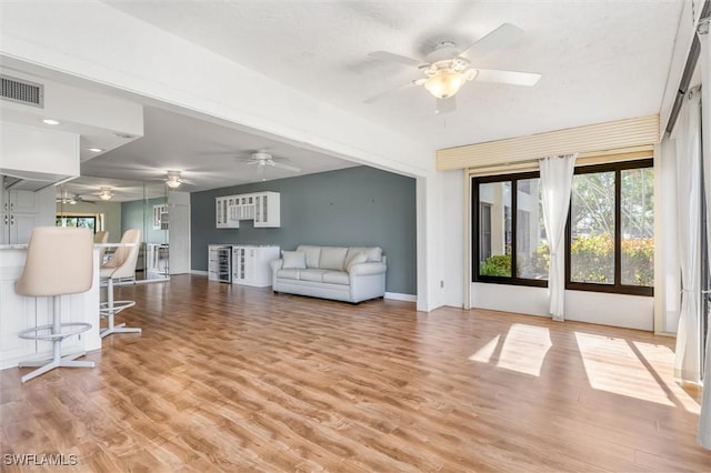 unfurnished living room with hardwood / wood-style flooring