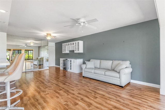 living room with light hardwood / wood-style flooring