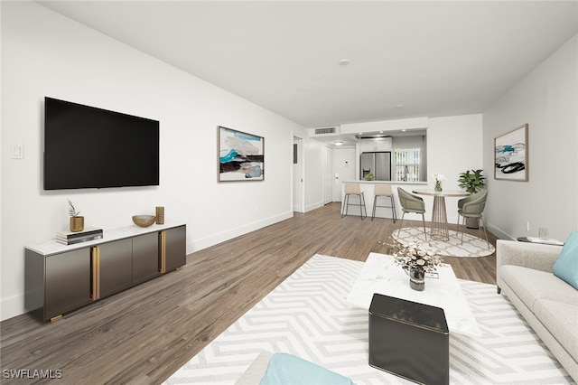 living room with hardwood / wood-style floors