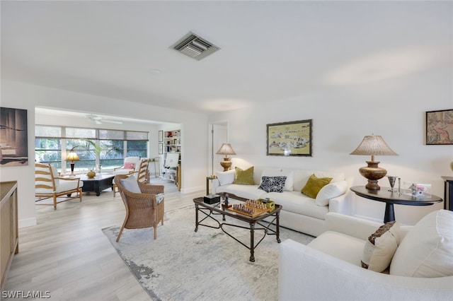 living room with light hardwood / wood-style floors