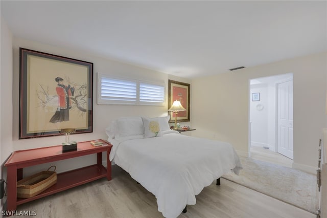 bedroom featuring light hardwood / wood-style floors