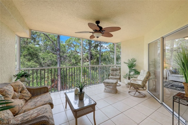 sunroom / solarium with ceiling fan