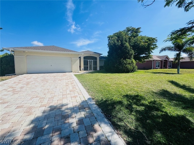 ranch-style home featuring a garage and a front lawn