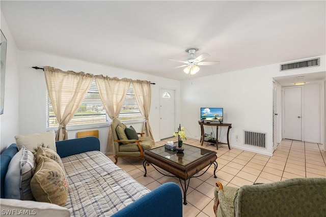 living room with light tile patterned floors and ceiling fan