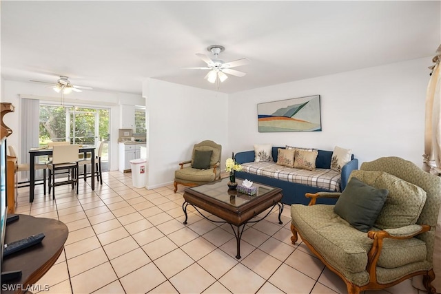 tiled living room featuring ceiling fan