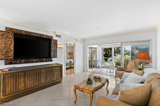 living room featuring ornamental molding and light tile floors