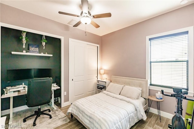 bedroom with a closet and ceiling fan