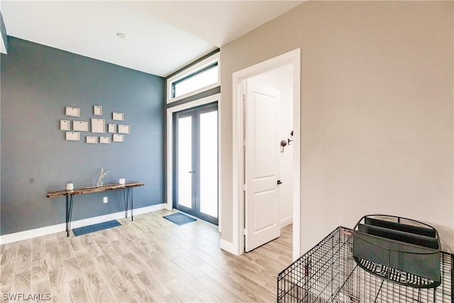 entrance foyer with light wood-type flooring