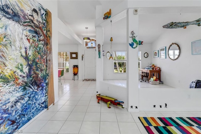 hallway with light tile patterned floors