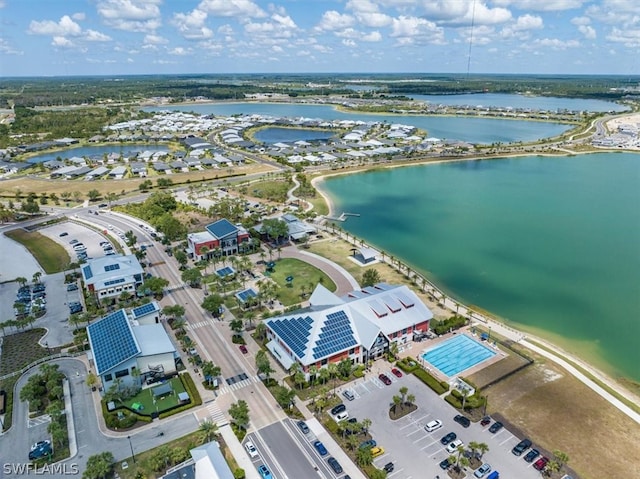 birds eye view of property featuring a water view