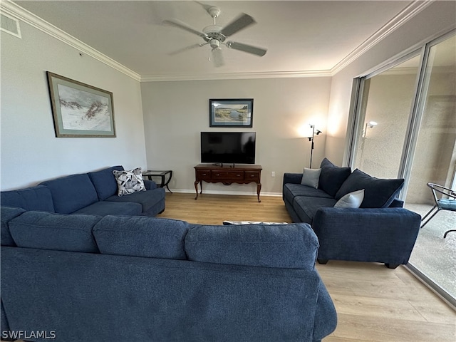 living room with crown molding, ceiling fan, and hardwood / wood-style floors