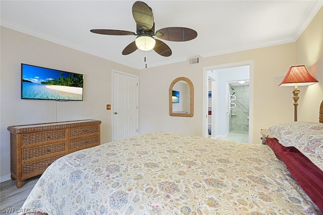 bedroom featuring ornamental molding, connected bathroom, ceiling fan, and hardwood / wood-style floors