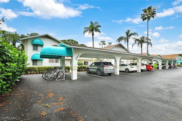 view of parking featuring a carport