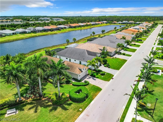 drone / aerial view with a water view