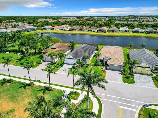 drone / aerial view featuring a water view