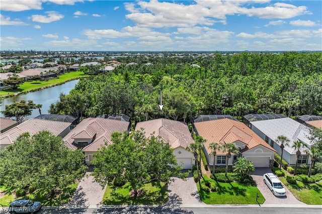 birds eye view of property featuring a water view