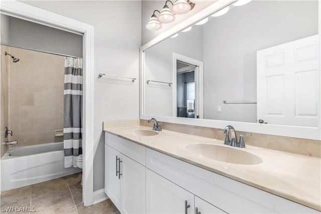 full bathroom featuring vanity, tile patterned floors, toilet, and shower / tub combo with curtain