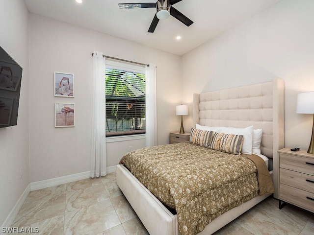 tiled bedroom featuring ceiling fan