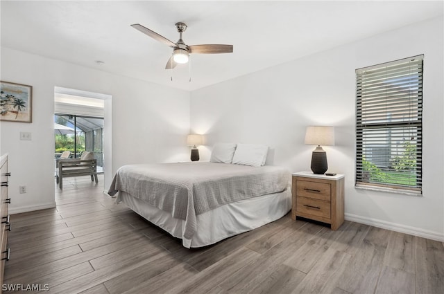 bedroom with light hardwood / wood-style flooring and ceiling fan