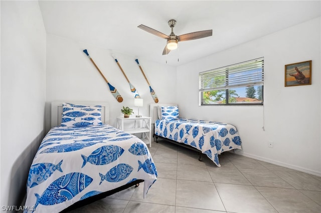 tiled bedroom with ceiling fan