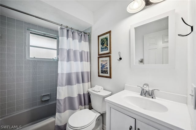 full bathroom with vanity, toilet, and shower / bath combo with shower curtain