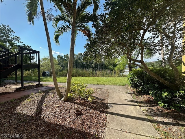 view of yard with a deck