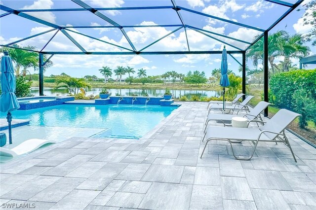 view of pool featuring a patio area, pool water feature, an in ground hot tub, and a lanai