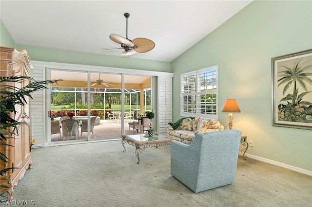 living room featuring high vaulted ceiling, ceiling fan, and carpet flooring