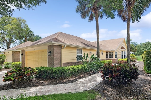 view of side of property featuring a garage