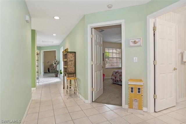 hallway with light carpet