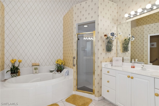 bathroom with separate shower and tub, tile floors, and vanity