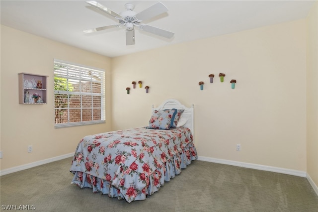 bedroom with ceiling fan and carpet