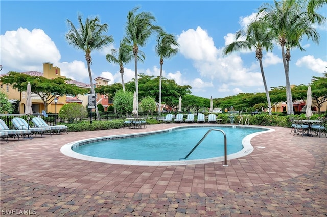 view of swimming pool featuring a patio