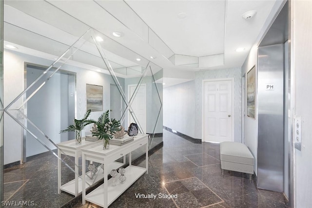 interior space featuring tile patterned floors and elevator