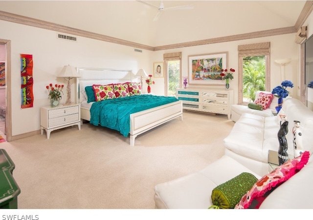 bedroom with ceiling fan, vaulted ceiling, carpet, and ornamental molding