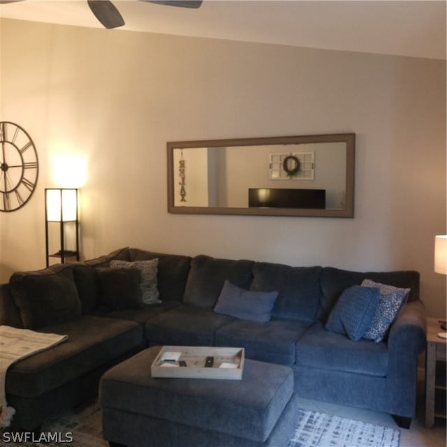 living room featuring ceiling fan