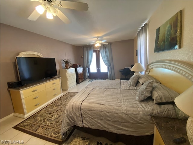 bedroom with ceiling fan and light tile floors