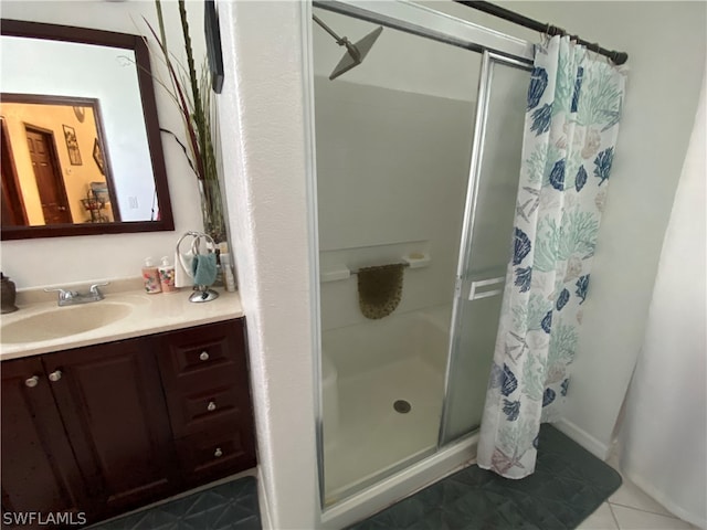 bathroom featuring a shower with shower curtain, tile floors, and vanity