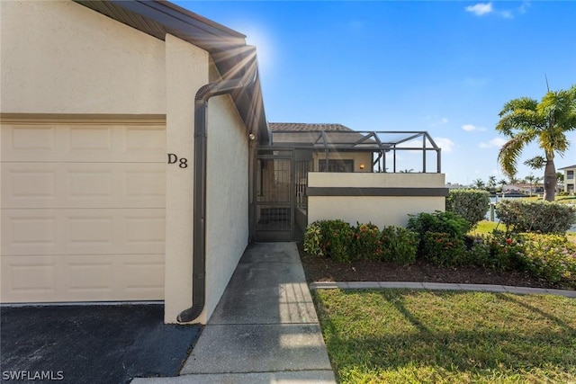 view of side of home with a garage