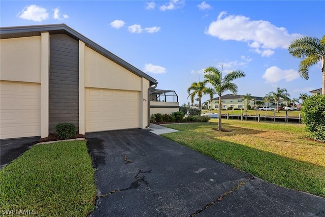 garage with a yard