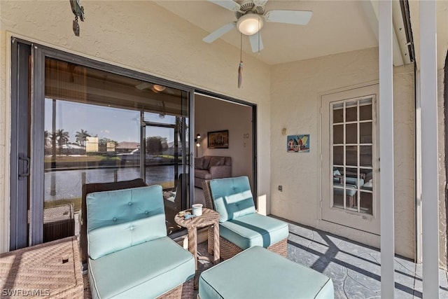 view of patio / terrace featuring ceiling fan