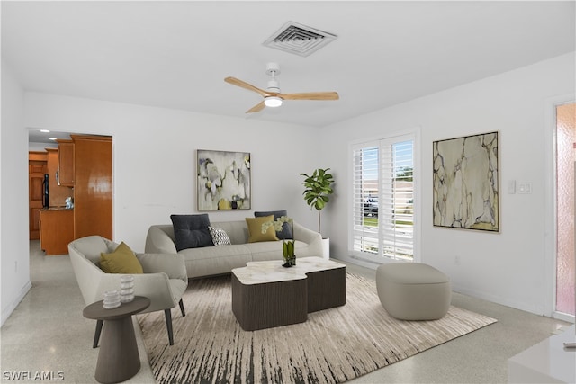 living room with ceiling fan