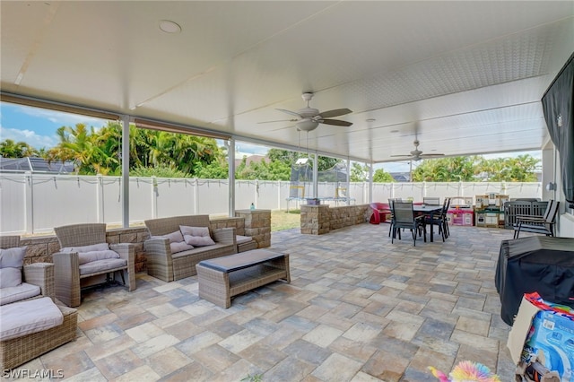 view of terrace featuring ceiling fan and an outdoor hangout area