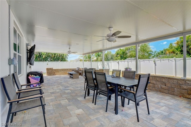 view of terrace featuring ceiling fan