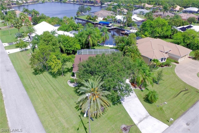 birds eye view of property featuring a water view