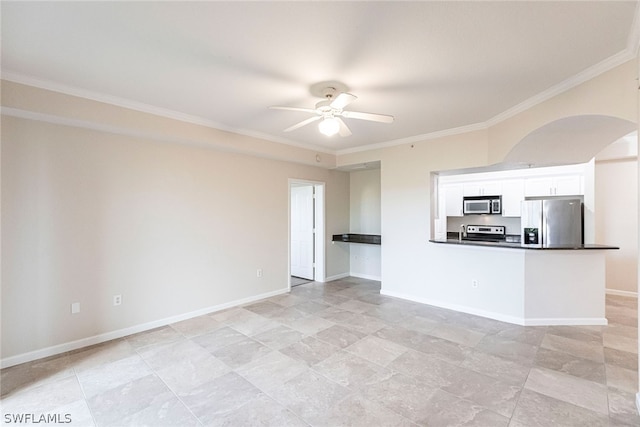 interior space with white cabinetry, ornamental molding, appliances with stainless steel finishes, light tile floors, and ceiling fan