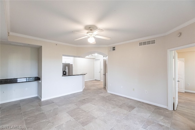 unfurnished living room featuring ceiling fan, crown molding, and light tile floors