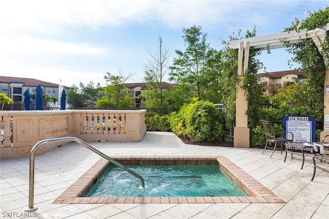 view of pool featuring a patio